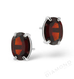 Garnet 7 X 5mm And 9k White Gold Earrings