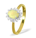 Opal 7 X 5mm And Diamond 9k Yellow Gold Ring