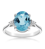 9k White Gold Diamond And 2.60ct Blue Topaz Ring