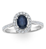 Blue Sapphire And Diamond Halo Ring Set In 18k White Gold