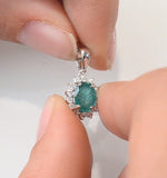 Emerald 7 X 5mm And Diamond 9k White Gold Pendant Necklace