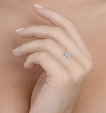 Halo Ring With 0.11ct Of Diamonds Set In 9k White Gold