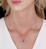2ct Tanzanite And Diamond Halo Square Asteria Necklace In 18k Gold