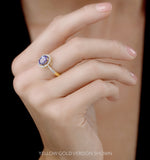 Tanzanite And Diamond Oval Halo Ring In 18kw Gold - Asteria Collection