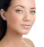 0.06ct Diamond And 9k White Gold Crossbone Earrings