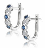 Stellato Sapphire And Diamond Eternity Earrings In 9k White Gold