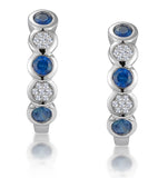 Stellato Sapphire And Diamond Eternity Earrings In 9k White Gold