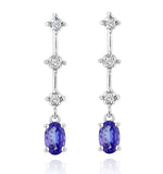 Tanzanite 0.56ct And 0.07ct Diamond 9k White Gold Drop Earrings