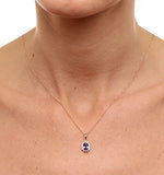 Tanzanite 7 X 5mm And Diamond 18k Yellow Gold Pendant Necklace