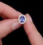 Tanzanite 7 X 5mm And Diamond 18k White Gold Earrings