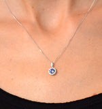 Tanzanite 5mm And Diamond 18k White Gold Pendant Necklace