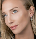 Diamond Swirl Drop Earrings 0.65ct Set In 18k White Gold
