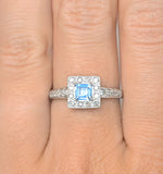 Blue Topaz 0.45ct And Diamond 9k White Gold Ring