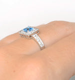 Blue Topaz 0.45ct And Diamond 9k White Gold Ring
