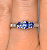 Tanzanite 0.59ct And Diamond 9k White Gold Ring