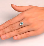 Emerald 0.83ct And Diamond 9k White Gold Ring