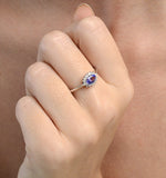 Tanzanite 6 X 4mm And Diamond 18k White Gold Ring