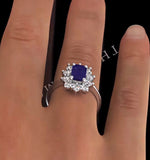 Tanzanite 7 X 5mm And 0.50ct Diamond 18k White Gold Ring