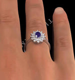 Tanzanite 6 X4mm And Diamond 18k White Gold Ring