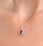 Ruby 7 X 5mm And Diamond Halo 18k White Gold Pendant Necklace