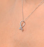 Ruby 0.33ct And Diamond 9k White Gold Ribbon Pendant Necklace