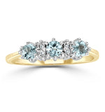 Blue Topaz 0.50ct And Diamond 9k Yellow Gold Ring